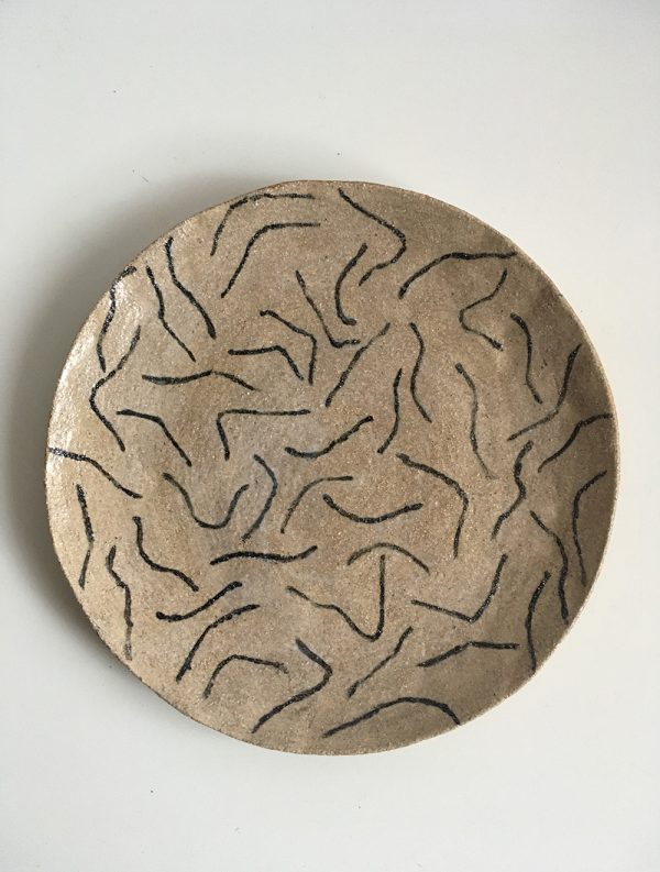 Hand-built plate with organic pattern