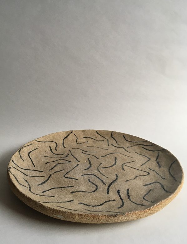 Hand-built plate with organic pattern